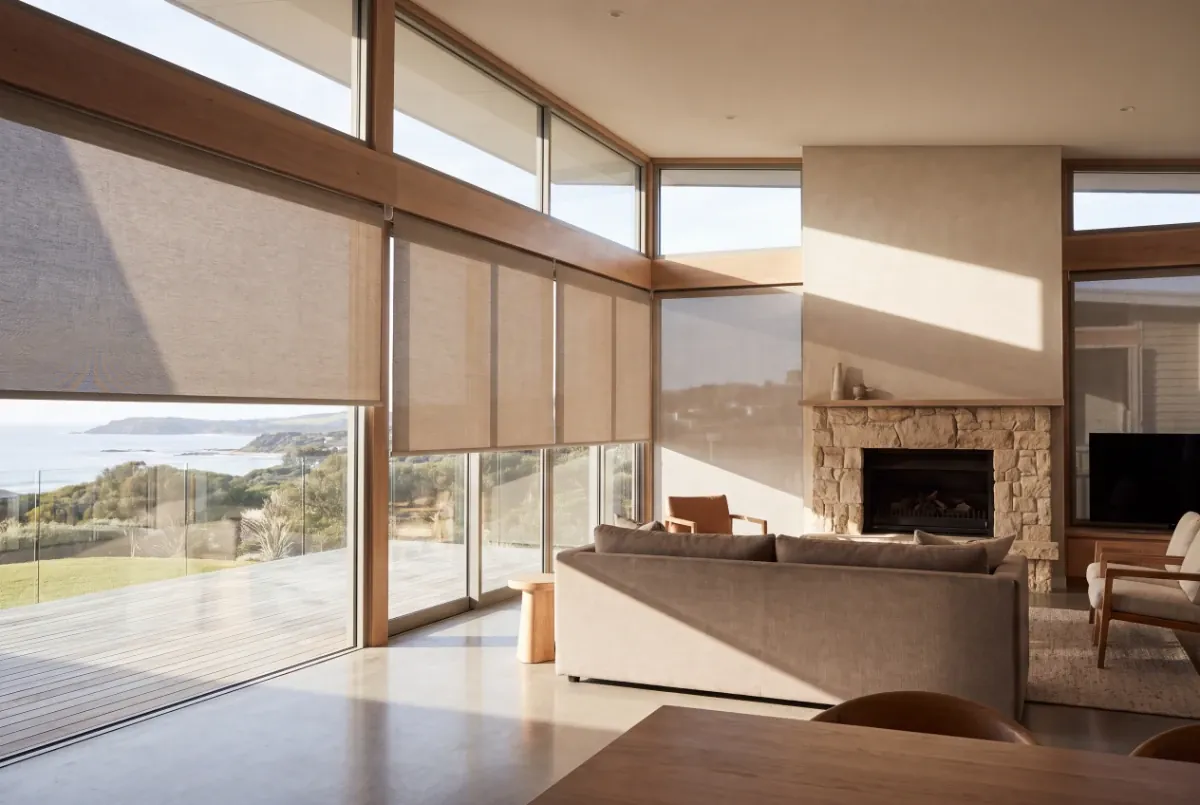 Motorised roller blinds on a wall of windows