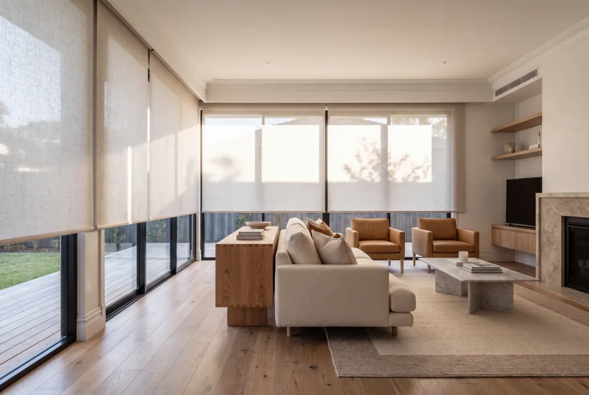 Light-filtering roller blinds in a living room